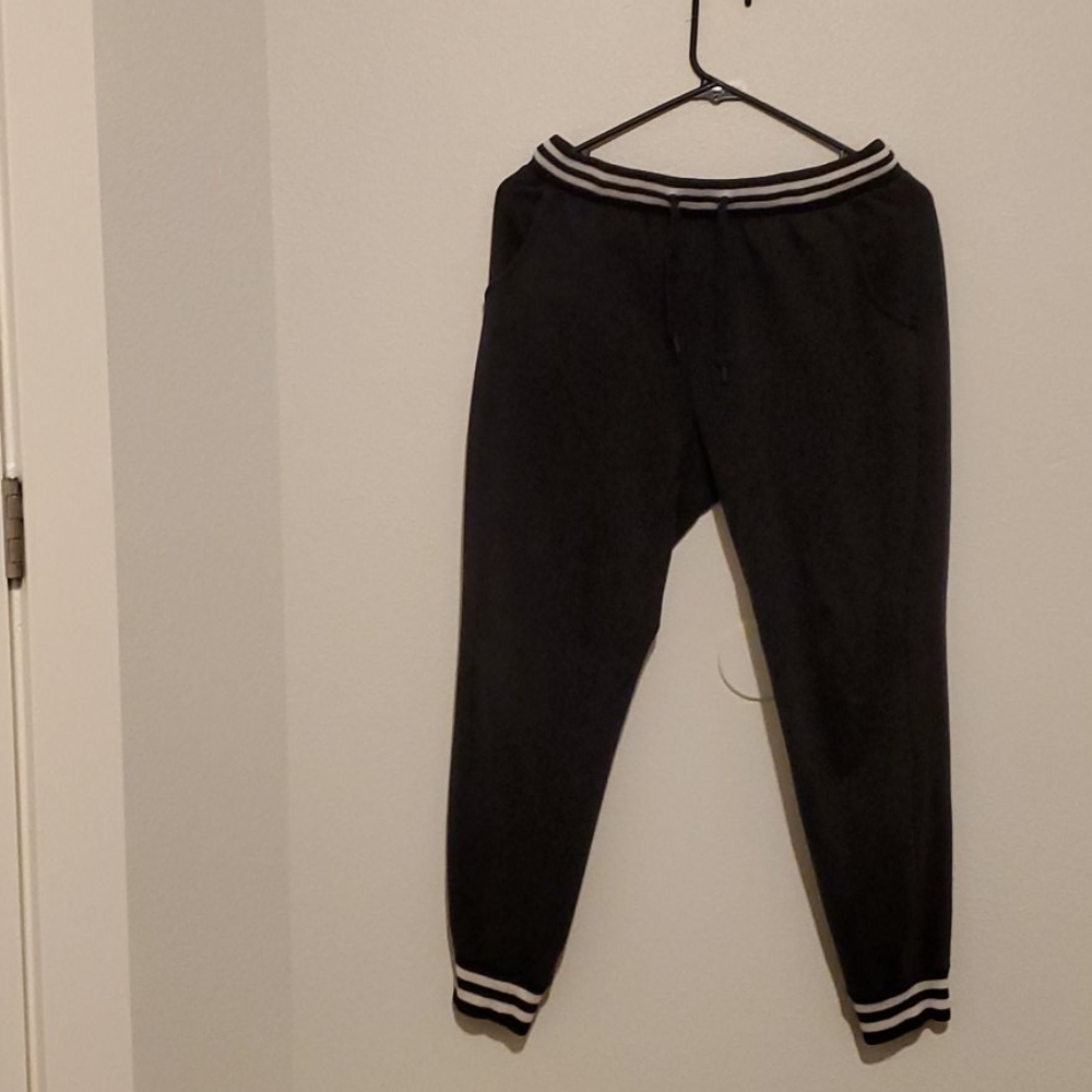 Black Joggers With Black and White Striped Lining